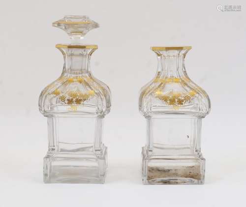Two glass decanters, 19th century, each with octagonal necks...