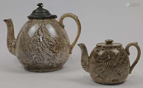 Two Staffordshire pottery faux bois teapots, late 19th / ear...
