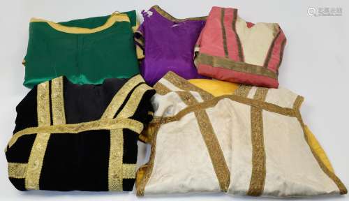 A collection of various vestments, to include a cope, chasub...