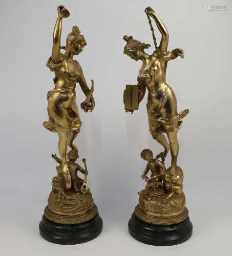 After Victor Rousseau, Belgian, 1865-1954, a pair of gilt sp...