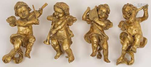 A group of four gilded resin ornamental putti, 20th century,...