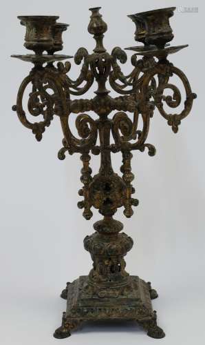 A French gilt-bronze candelabra, late 19th century, with scr...