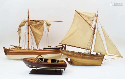 Three model wood boats, 20th century, comprising: a multi-sa...