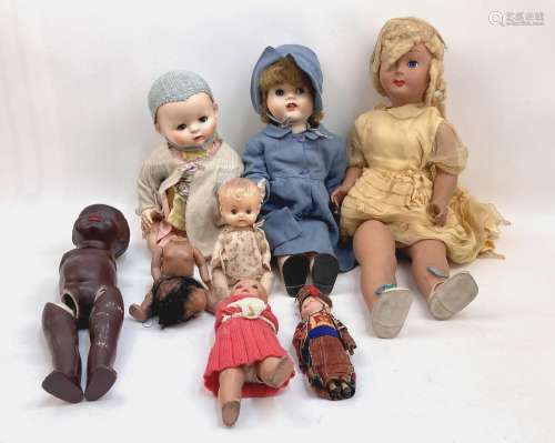 A mixed lot of vintage composition and plastic dolls, togeth...