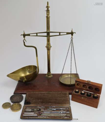 A set of brass weighing scales by W. & T. Avery, late 19...