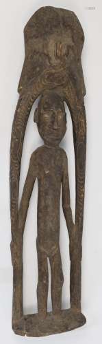 A Papua New Guinean wooden figural carving, probably Sepik r...