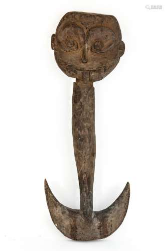 A Sepik carved wooden suspension hook, Papua New Guinea, Mel...