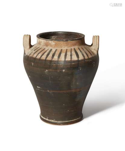 A pottery vessel with tapering body, looped handles at the s...
