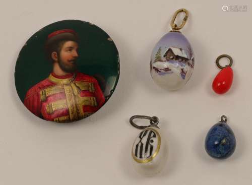 Four Russian enamelled and stone miniature Easter eggs penda...