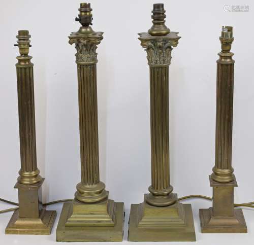Two pairs of brass columnar table lamps, 20th century, the f...
