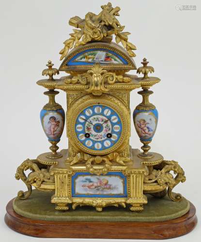 A French Sevres style gilt-metal and porcelain mounted clock...