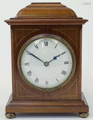 A Regency style mahogany and brass inlaid mantel timepiece, ...