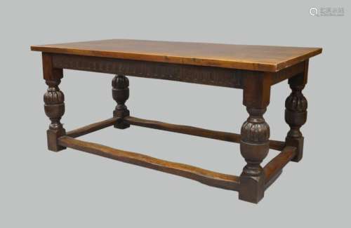 A 16th century style oak refectory table, early 20th century...