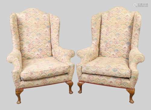A pair of George III style oak framed wing back armchairs, e...