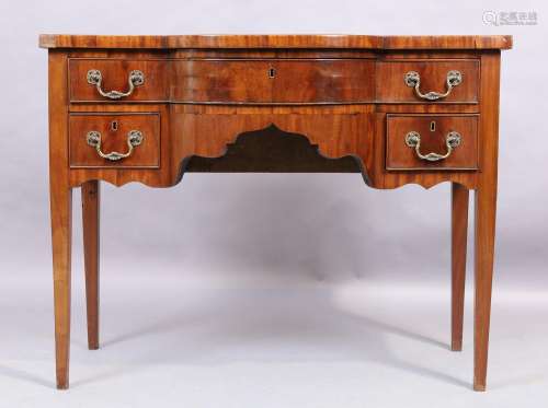 A George III style mahogany serpentine front side table, las...