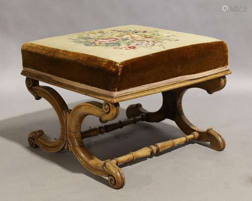 A Victorian mahogany X-framed stool, circa 1860, with floral...