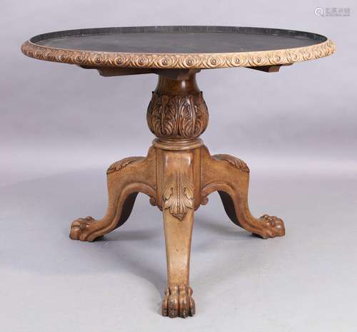 A Victorian style oak table, 20th century, the circular top ...