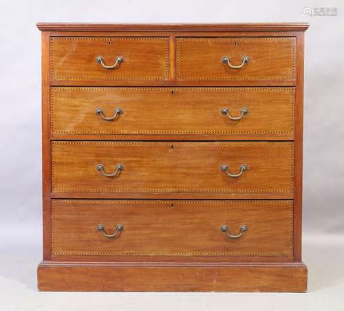 An Edwardian inlaid mahogany chest, two short over three lon...