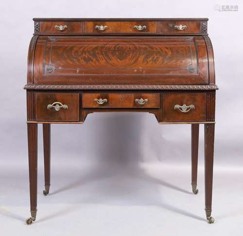 An Edwardian mahogany cylinder bureau, early 20th century, w...