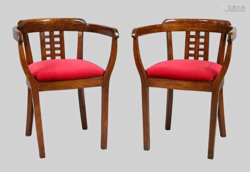 A pair of bentwood tub chairs, 20th century, with red velour...