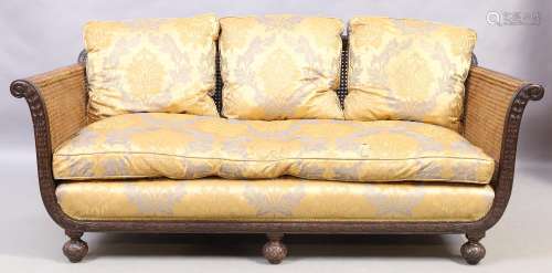 A French mahogany three piece bergere suite, first quarter 2...