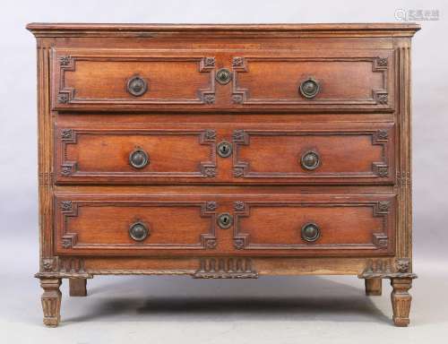 A French oak commode, first quarter 19th century, with three...