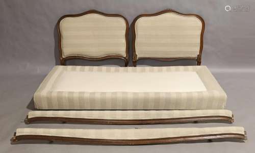 A French stained beechwood single bed, early 20th century, t...