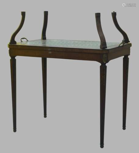 A French walnut two tier centre table, late 19th century, la...