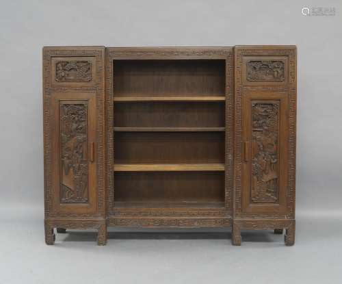 A Chinese hardwood inverted breakfront bookcase, early 20th ...