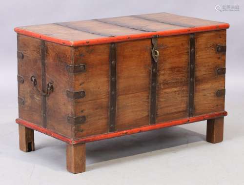 An Indonesian teak chest, early 20th century, iron bound, pa...