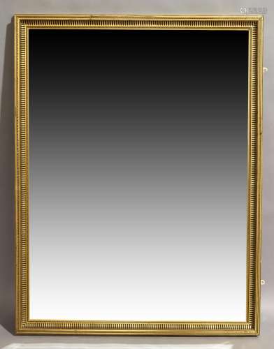 A large gilt framed rectangular wall mirror, late 20th centu...