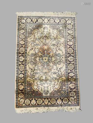 A small Persian part silk Kashan rug, 20th century, central ...