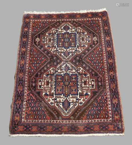 A Persian Afshar rug, 20th century, double diamond medallion...