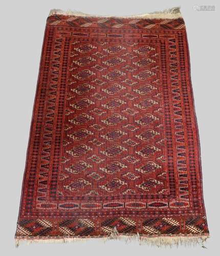 A Persian Bokhara rug, 20th century, the central field with ...