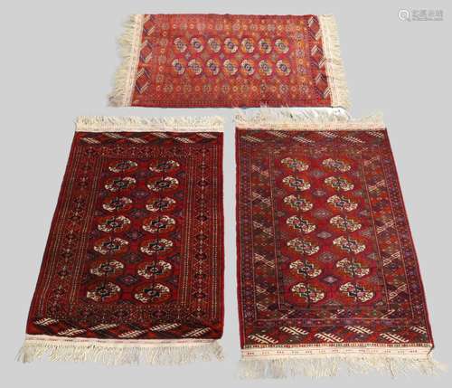 Three Bokhara rugs, late 20th century, gull motifs on red gr...