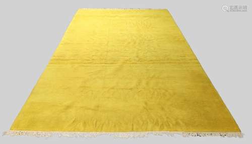 A large yellow ground woollen carpet, 20th century, 510cm x ...