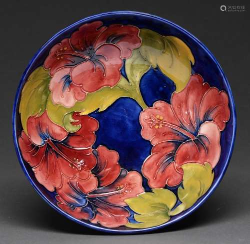 A Moorcroft Hibiscus bowl, late 20th c, 26cm diam, impressed...