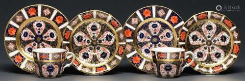 A pair of Royal Crown Derby Imari pattern teacups, saucers a...