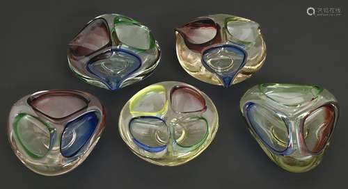 Five mid-century Murano blue, red and green cased glass asht...