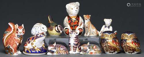 Twelve Royal Crown Derby paperweights, various sizes, printe...