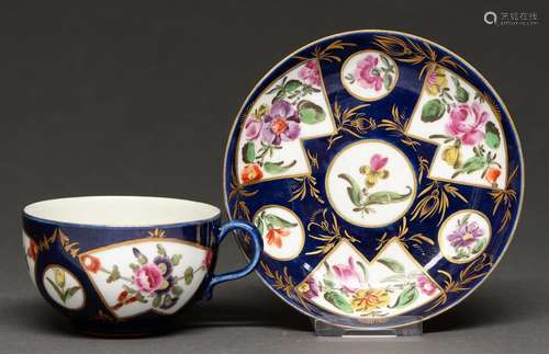 A Worcester powder blue ground teacup and saucer, c1770, pai...