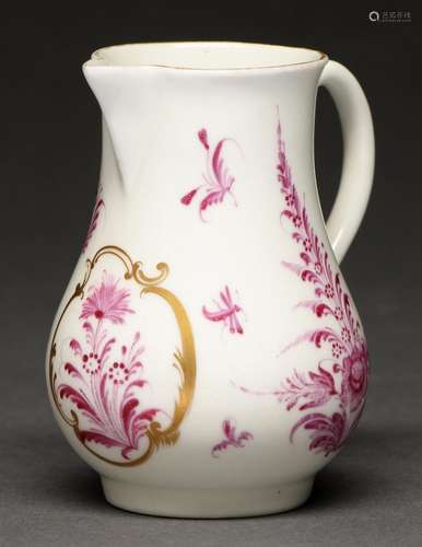 A Worcester sparrow beak cream jug, c1765, painted in puce m...