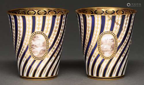 A pair of Royal Crown Derby beakers, 1917, of almost eggshel...