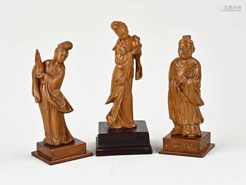 Three Chinese figurines, H 16 - 19 cm.