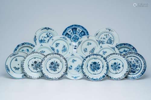 A varied collection of Chinese blue and white plates with fl...