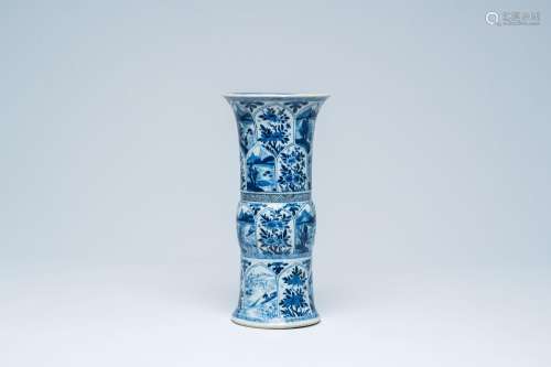 A Chinese blue and white 'gu' vase with panels with landscap...