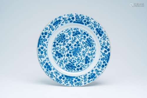 A Chinese blue and white 'peonies' charger, Yongzheng<br />
...
