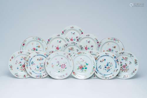 Fourteen Chinese famille rose plates with floral design, Qia...