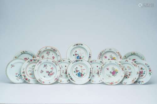 Fourteen Chinese famille rose plates with floral design, Qia...