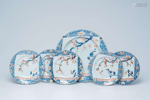 Five Chinese Imari style plates  and a charger with a scroll...